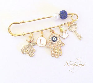 Beautiful Set of two items - Stroller Pin with Pacifier Clip for Good Luck and Protection
